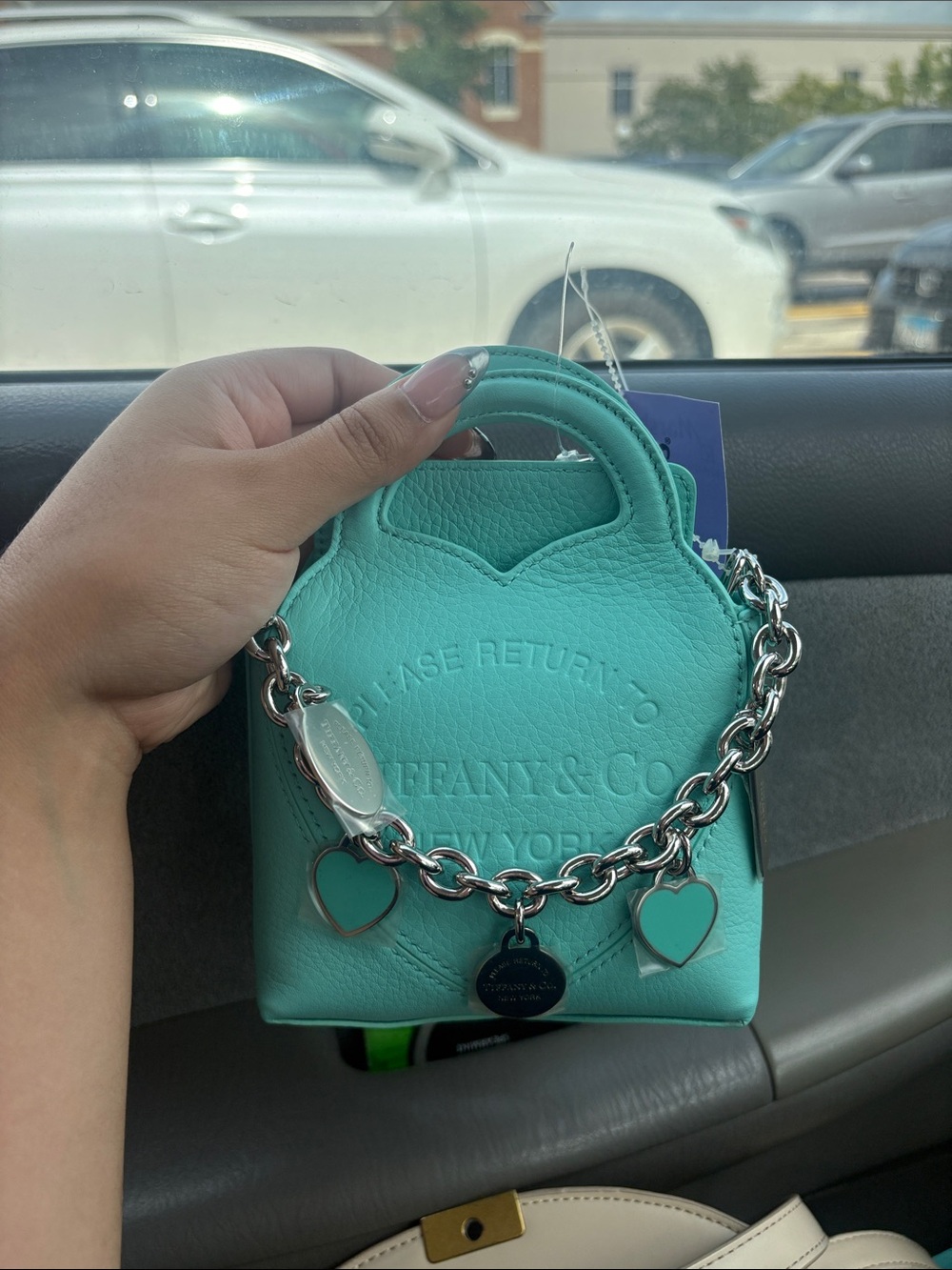 Tiffany & Co. Mini Leather Bag in Signature Blue-Green with Heart Charm Chain